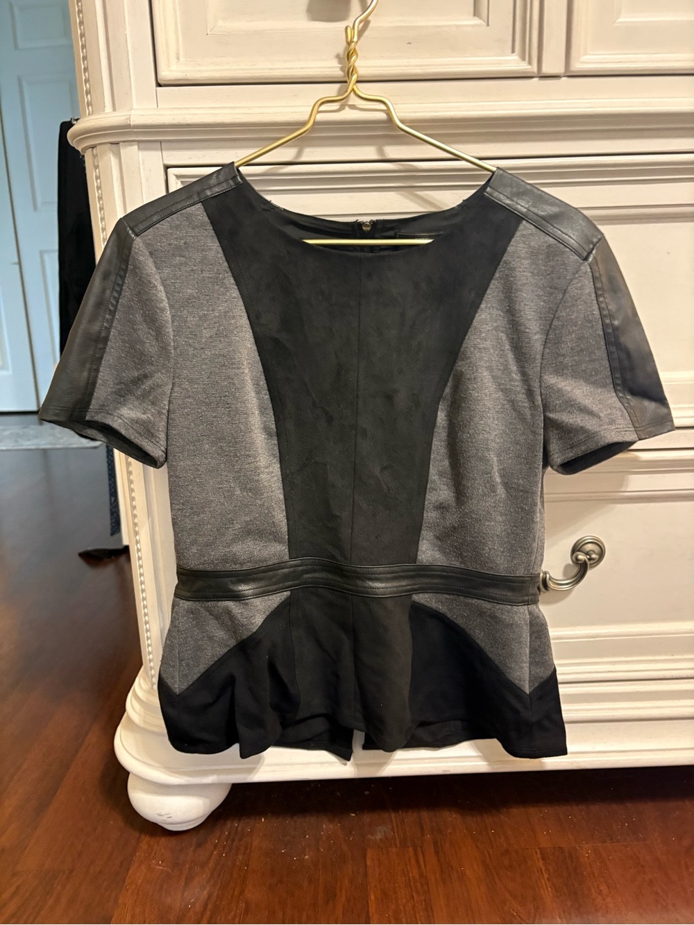 BCBGMaxAzria Gray and Black Colorblock Peplum Top